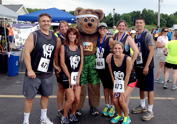 Group with Bear Mascot